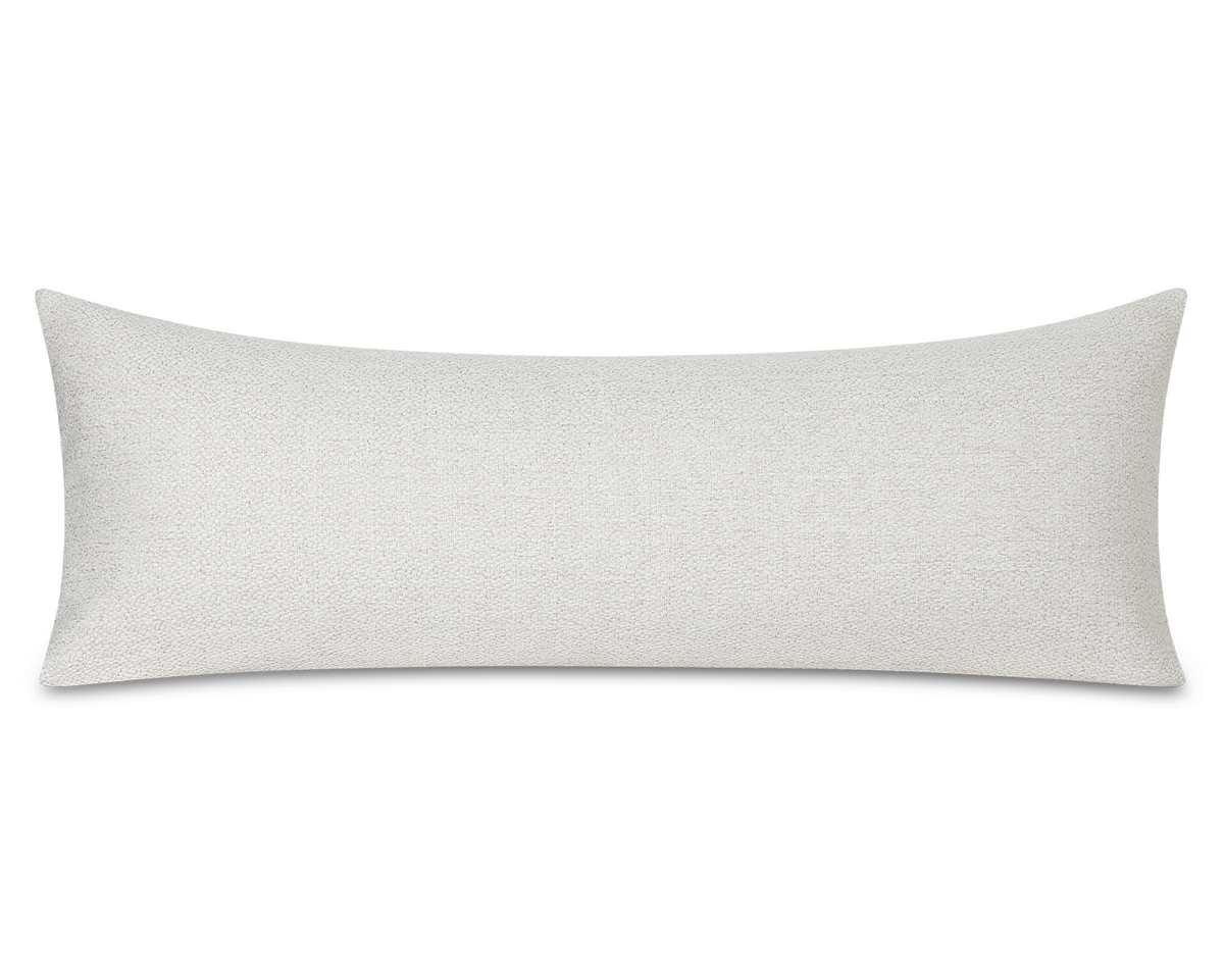 A long rectangular lumbar pillow in an ivory and beige textured fabric, shown against a plain white background.