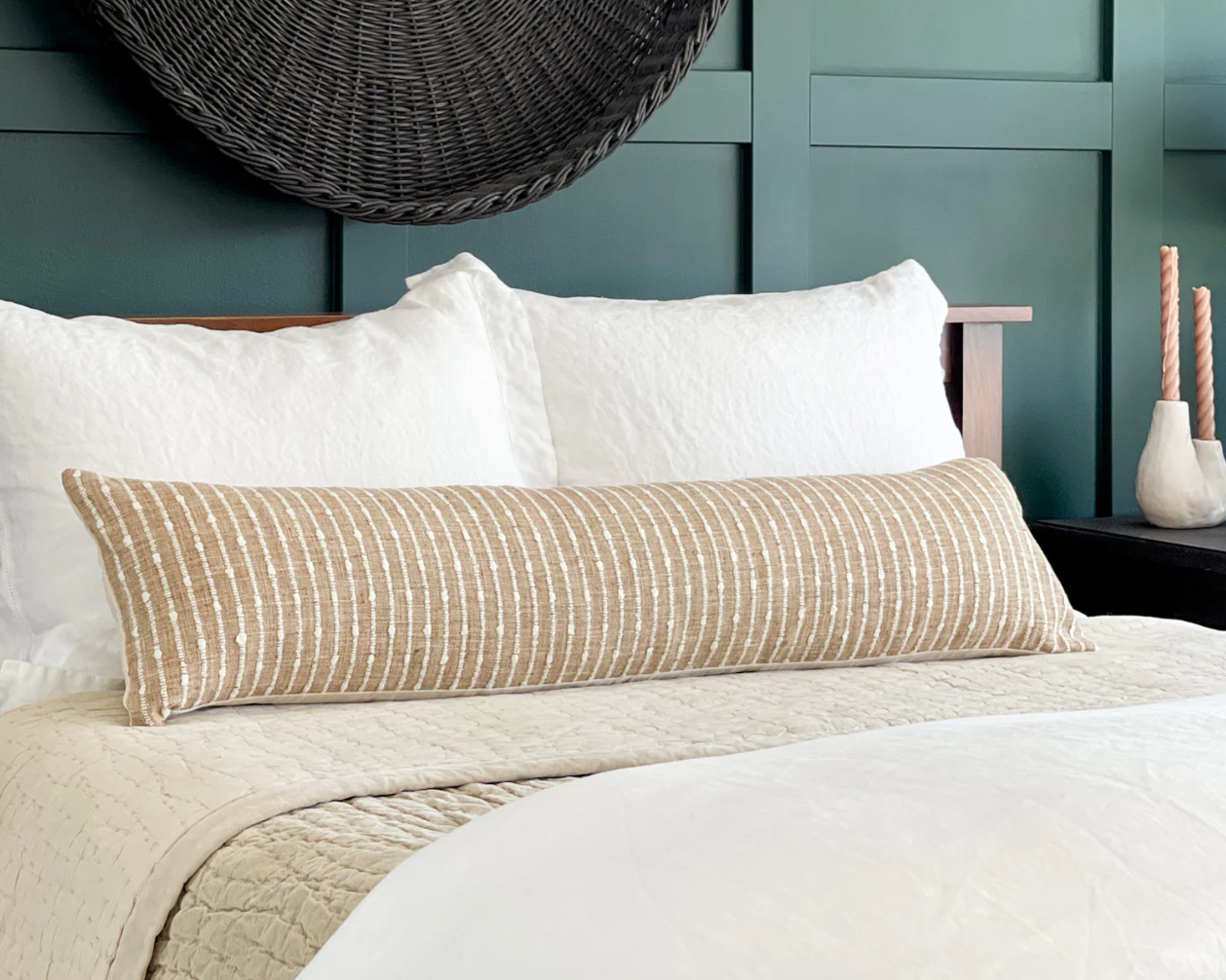 An Oversized Lumbar Pillow Is the Secret to Styling a King Bed or Bench perfectly.