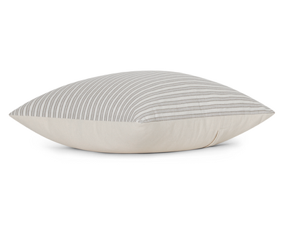 Flax and ivory ticking stripe cotton pillow cover, side view showing the cream cotton back