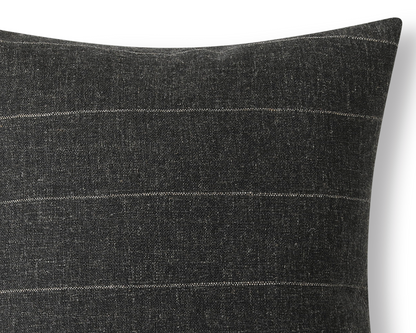 Close-up of the beige stripe woven into the charcoal fabric