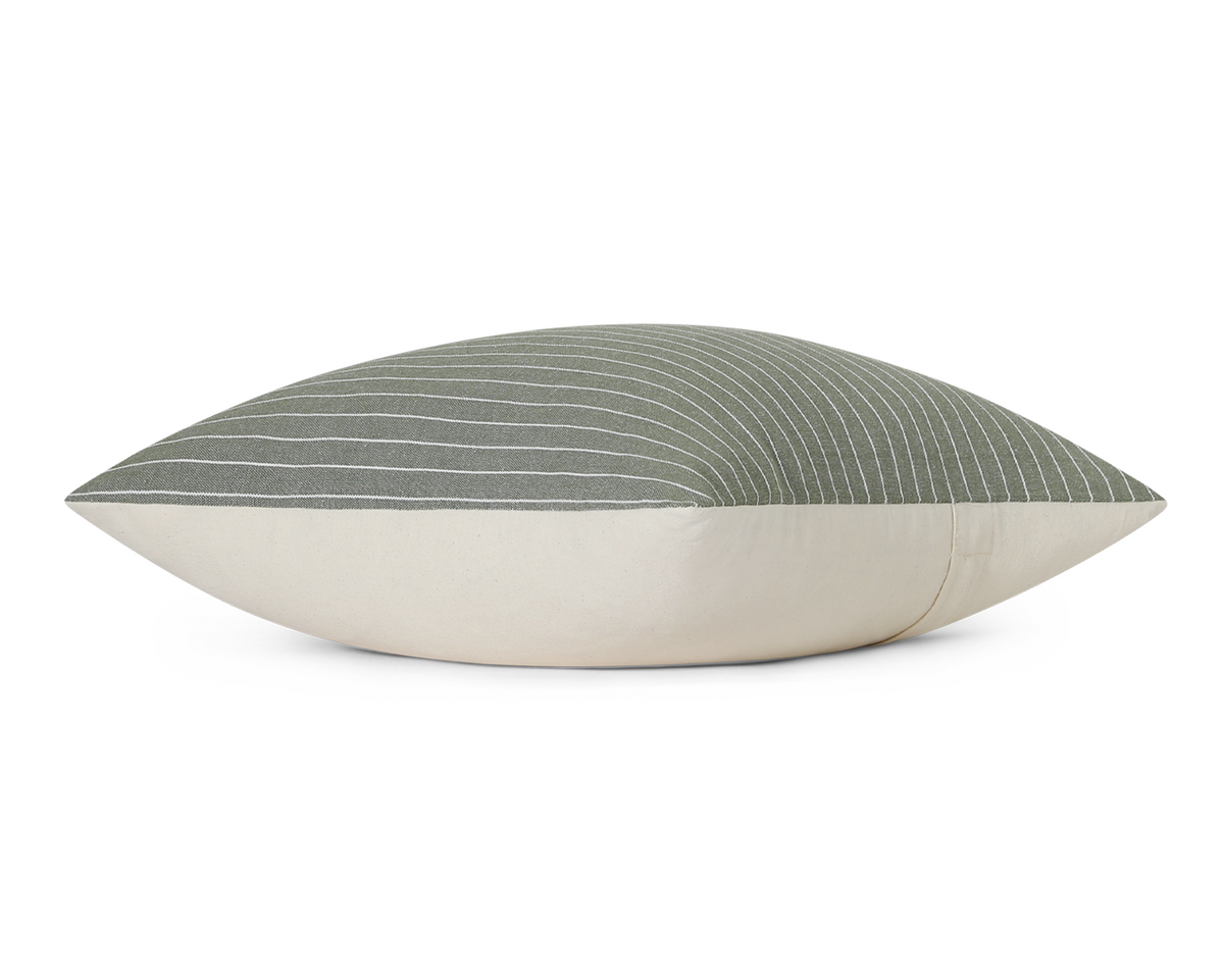 Thyme green pinstripe cotton pillow cover, side view showing the cream cotton back