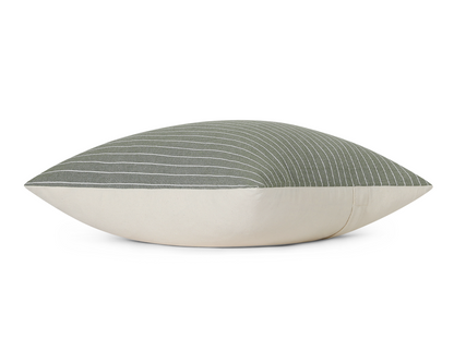 Thyme green pinstripe cotton pillow cover, side view showing the cream cotton back