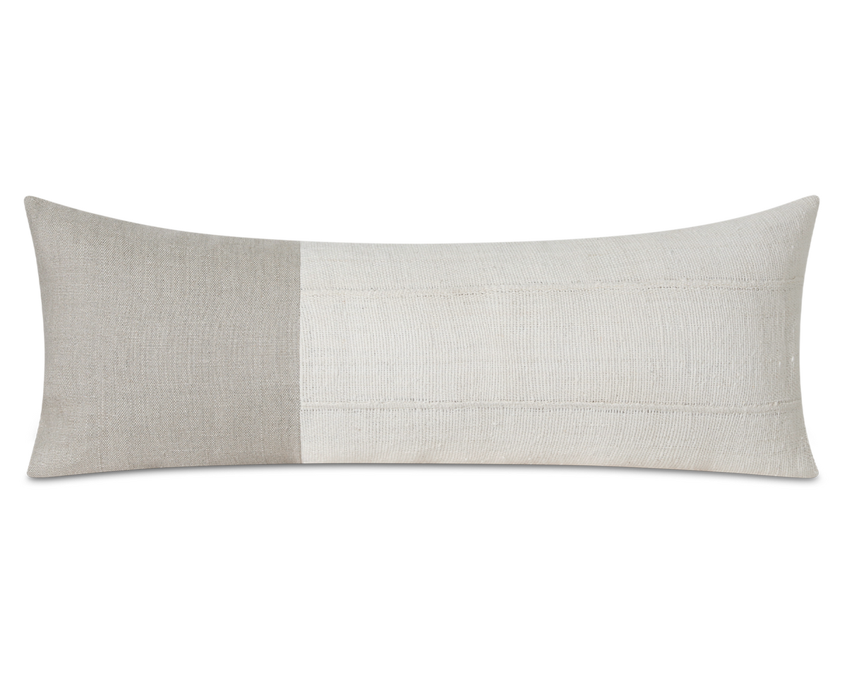 Cream linen and African mudcloth long lumbar pillow cover, shown on a white background