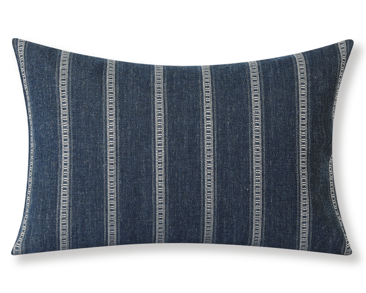 Taos in Indigo lumbar pillow cover, deep indigo blue with ivory ladder stripes