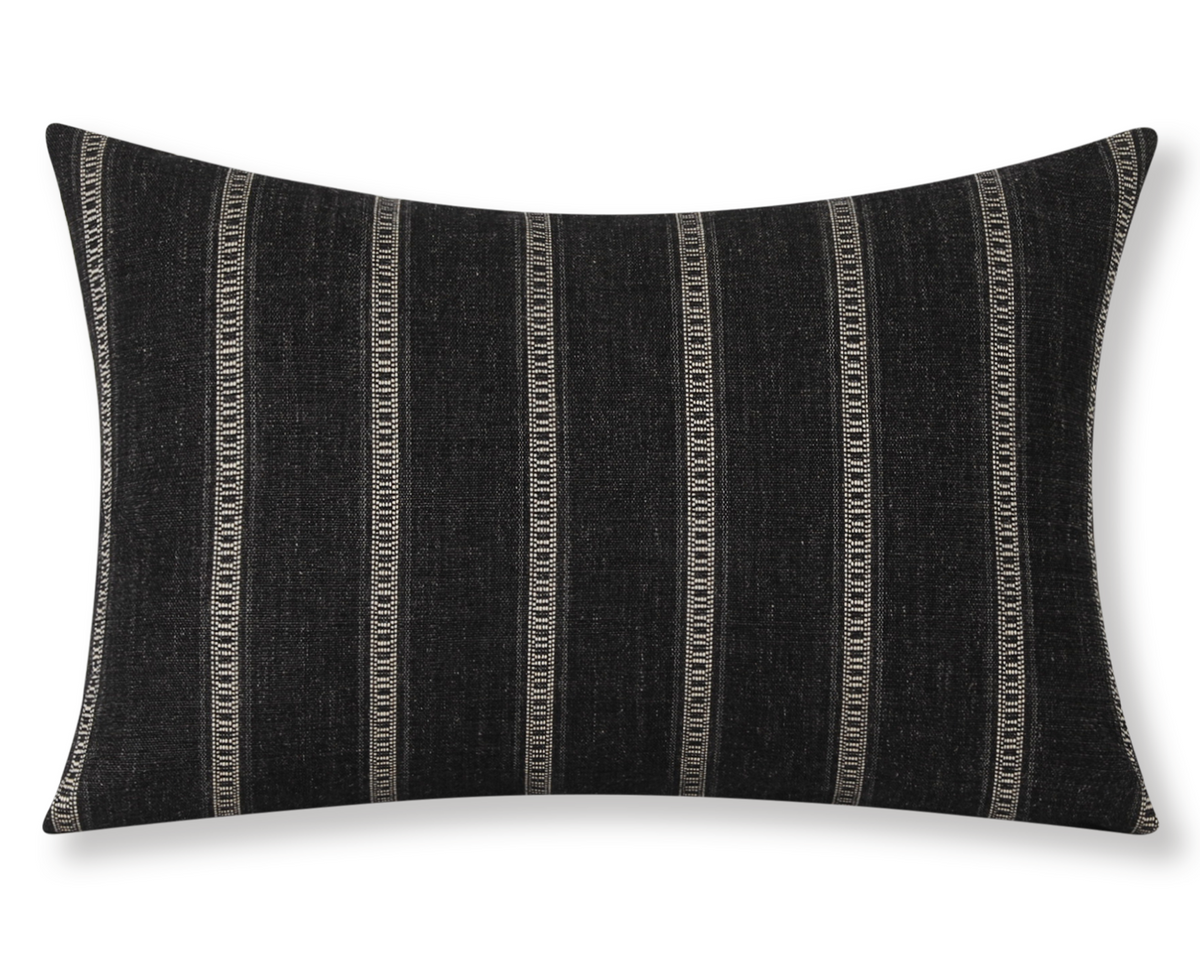 Taos in Onyx lumbar pillow cover, charcoal black with khaki ladder stripes and a black cotton back